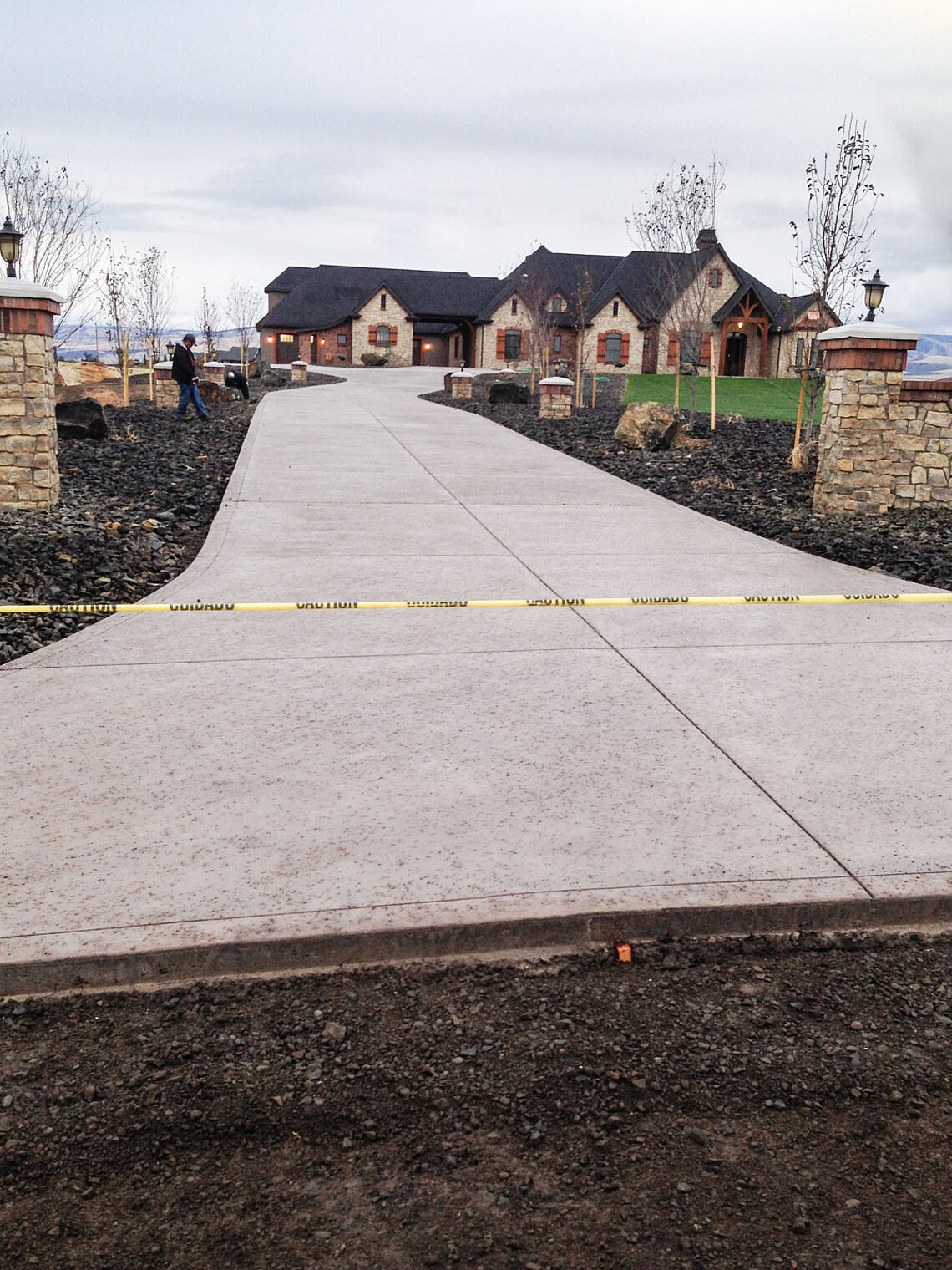 New residential concrete driveway with concrete stamping and colored