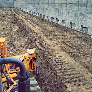 Grading for the air ventilated concrete slab for potato storage shed